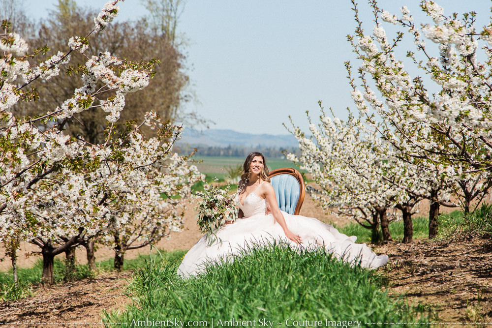 Perryhill Farm Wedding Flowering trees in orchard with bride
