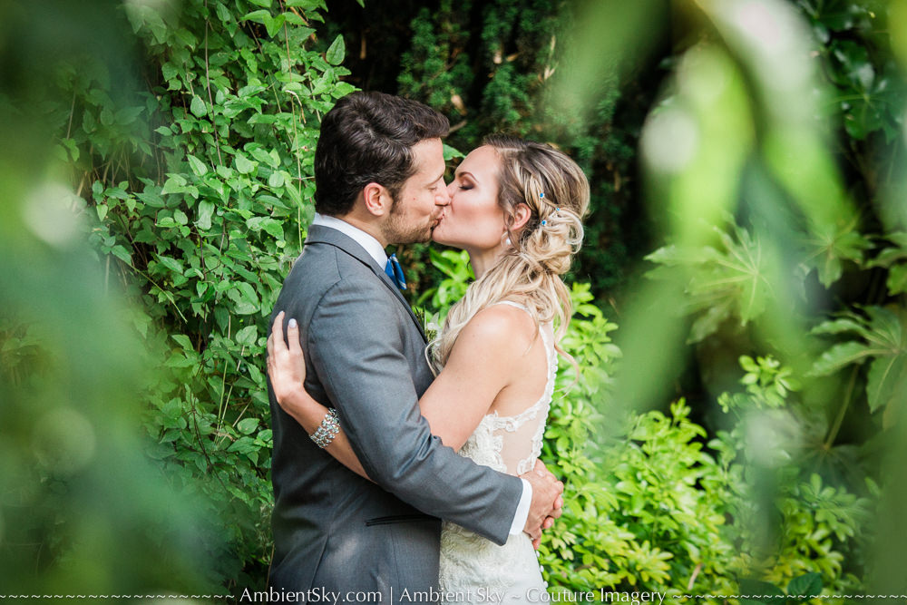 Bride and groom kissing wedding photography