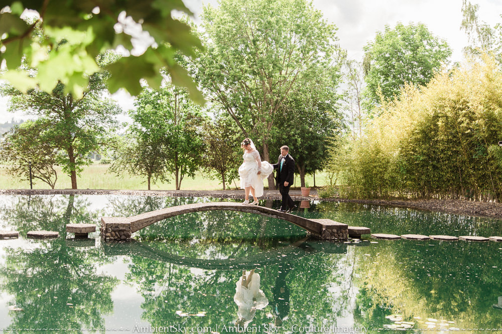 Water Oasis Wedding Photography Bride and groom on bridge